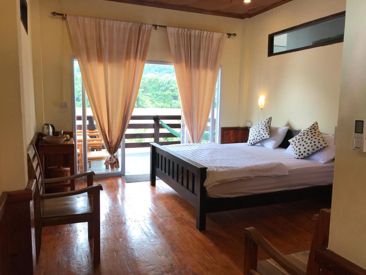 Riverview Bungalows & Gh Muang Ngoi Bagian luar foto